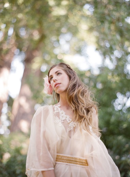 Bride walking under trees