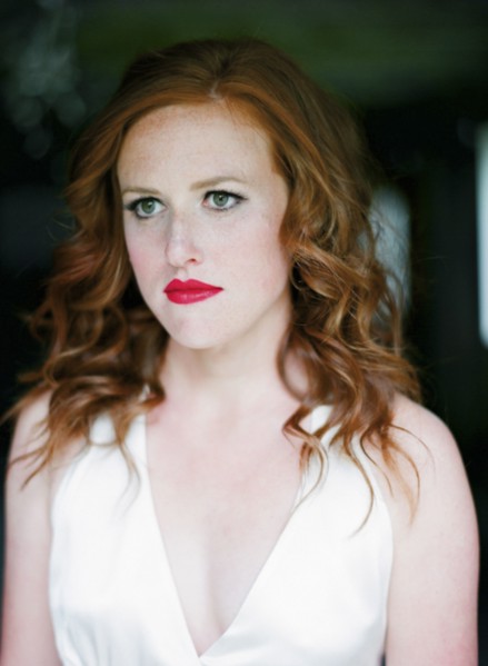 Close up of serious bride in wedding dress