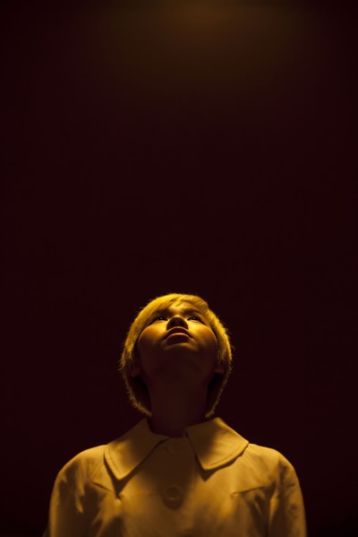 Asian woman looking up