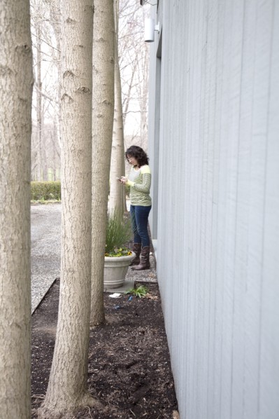 Caucasian woman using cell phone outdoors