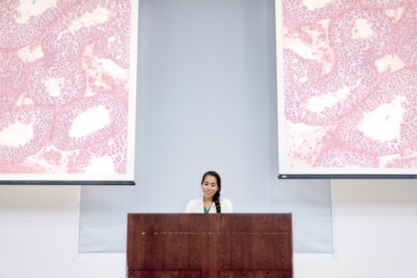 Armenian doctor speaking at podium
