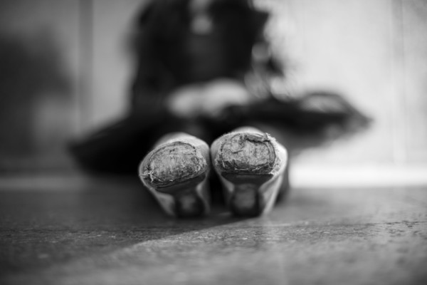 Close up of pointe shoes on ballet dancer