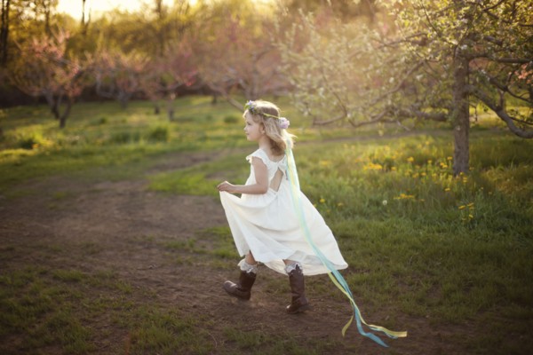 Caucasian girl walking on dirt path