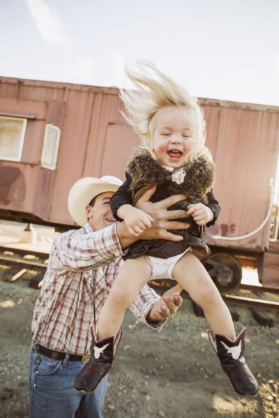 Father and daughter playing outdoors