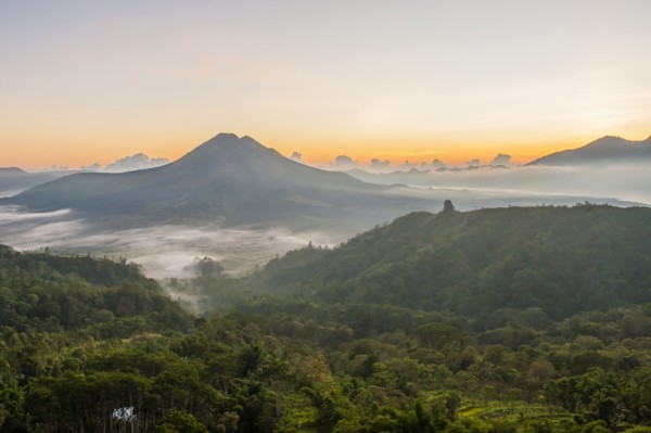 Hilltops over morning fog in remote landscape