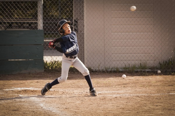 African American boy playing baseball
