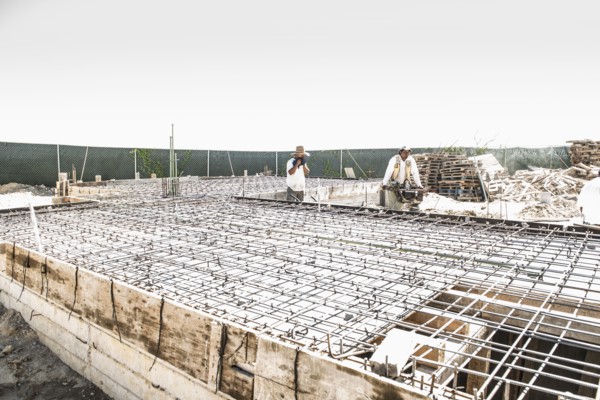 Hispanic construction workers at construction site