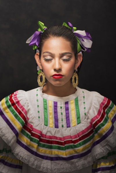 Hispanic teenage girl wearing Sinaloa Folkloric dress