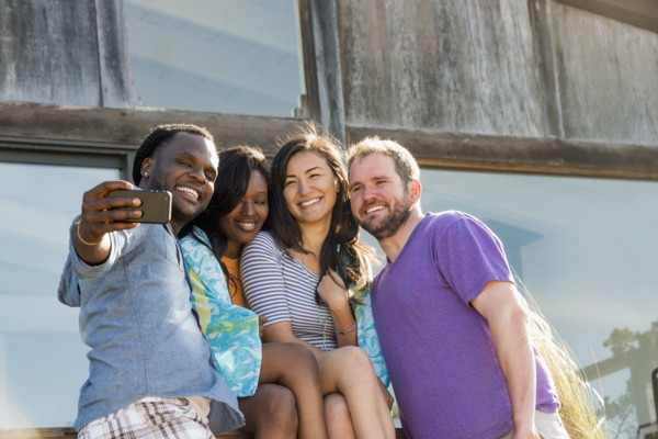 Friends taking selfie outdoors