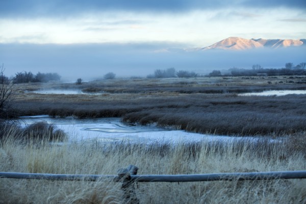 River in foggy mountain landscape