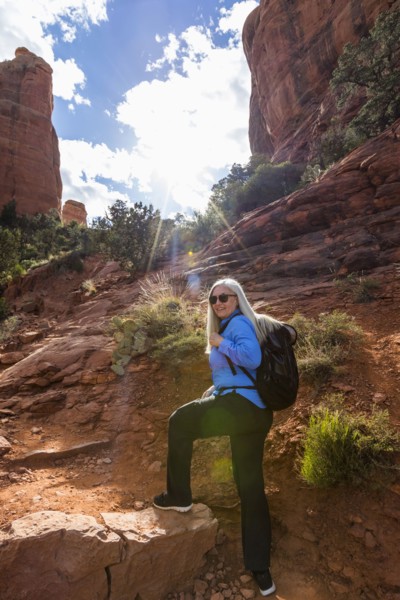 Caucasian woman hiking in desert landscape