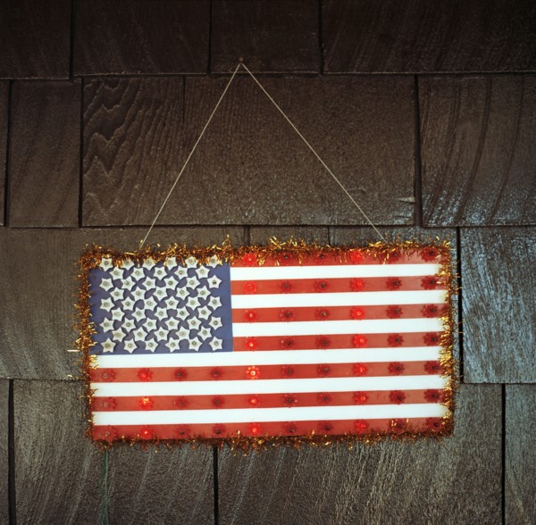 Handmade American flag hanging on wall