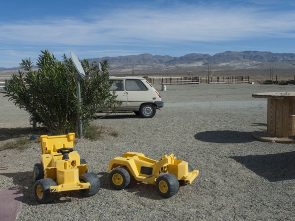 Toy bulldozers in rural desert park