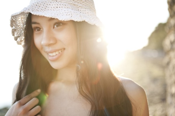 Smiling Chinese woman in hat