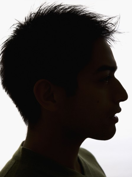 Silhouette profile of Pacific Islander man