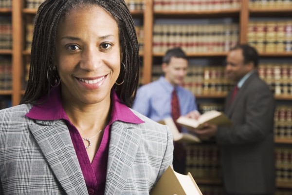 African American businesswoman in library