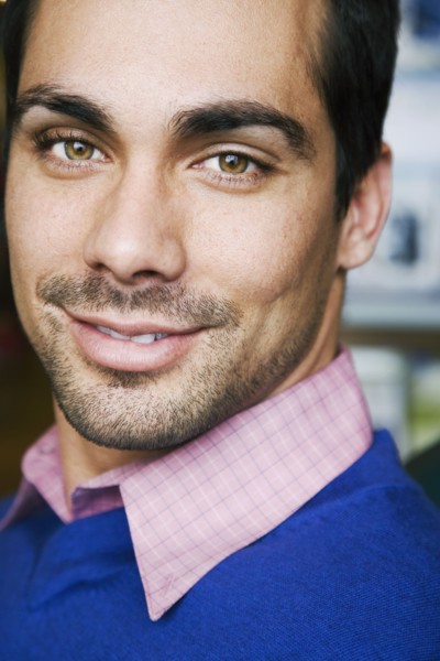 Close up of Pacific Islander man smiling