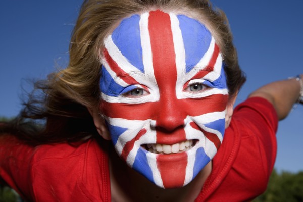 Caucasian girl with United Kingdom flag painted on face