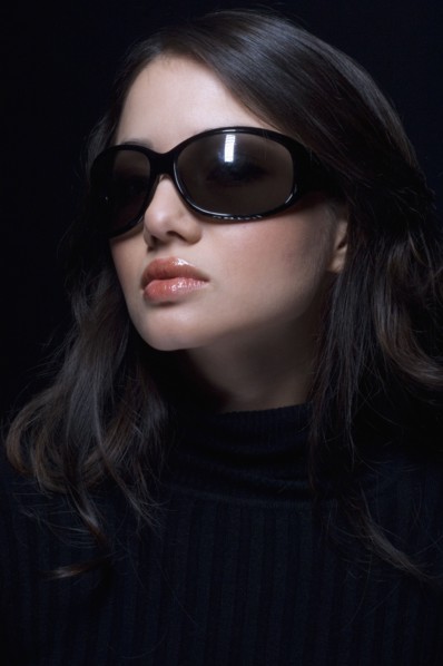 Portrait of Hispanic woman wearing sunglasses