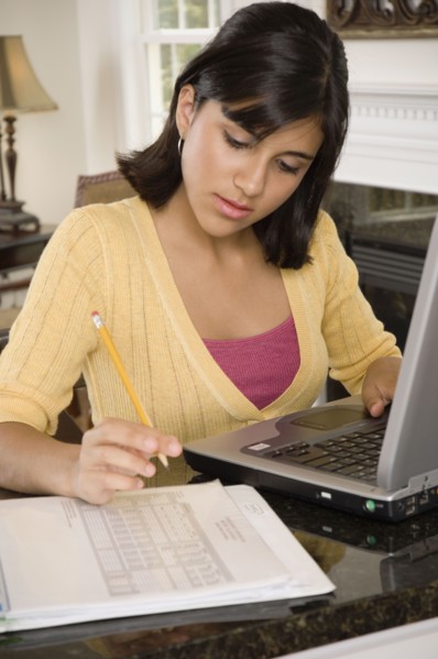 Mixed Race girl studying