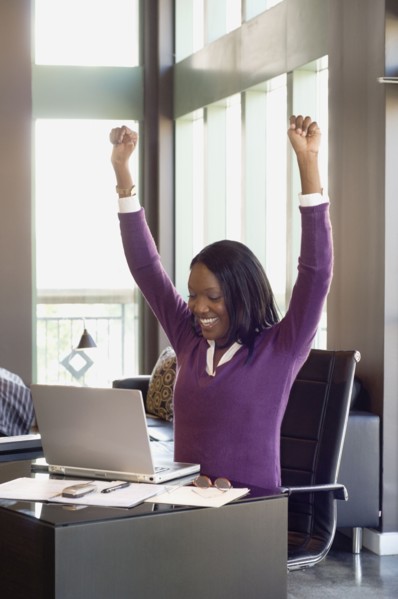 African businesswoman cheering