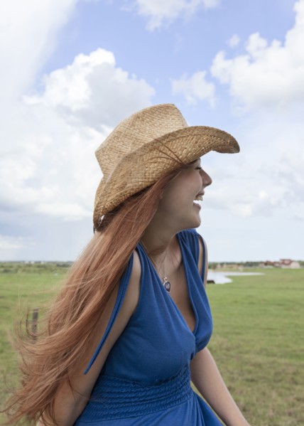 Caucasian woman in rural pasture