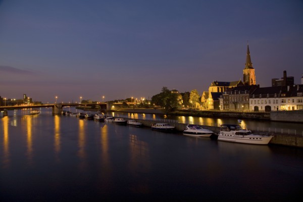 Dutch canal and boats at night