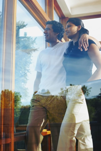Couple looking through window