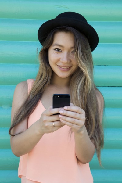 Asian woman using cell phone