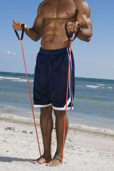African man stretching with exercise band