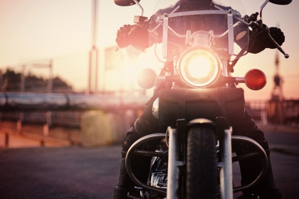 Caucasian man riding motorcycle