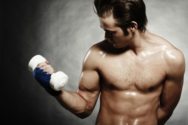 Caucasian athlete lifting weights
