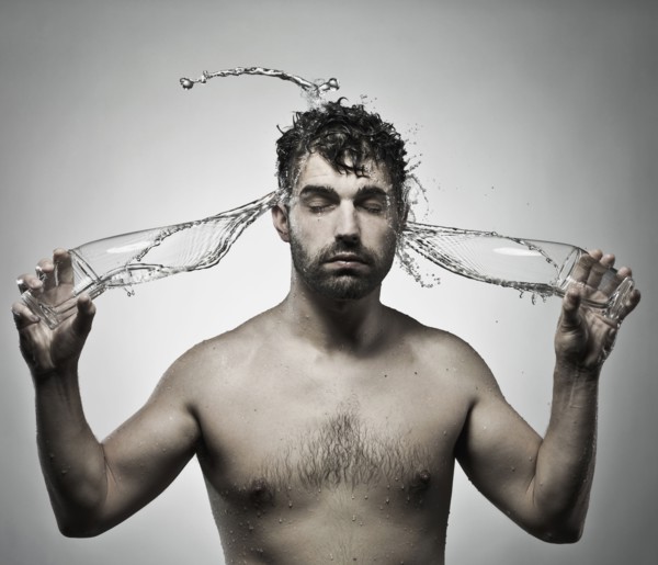 Man splashing himself with water