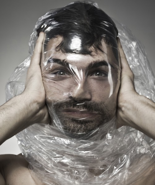 Man wrapped in plastic