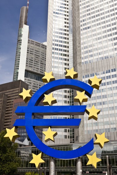 Euro symbol on city street