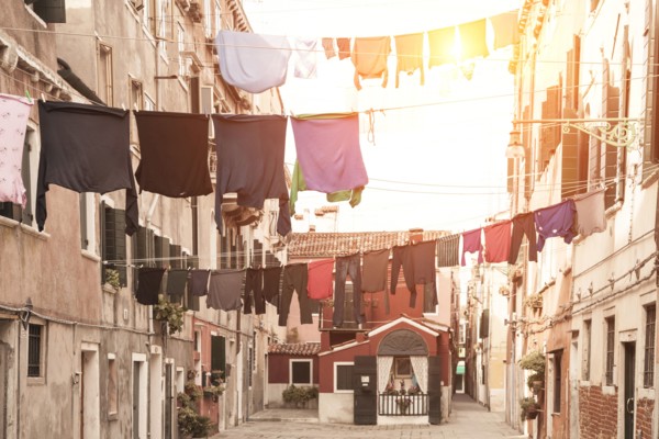 Laundry hanging from apartment buildings