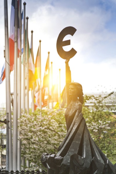 Statue with Euro symbol outside European Union Parliament