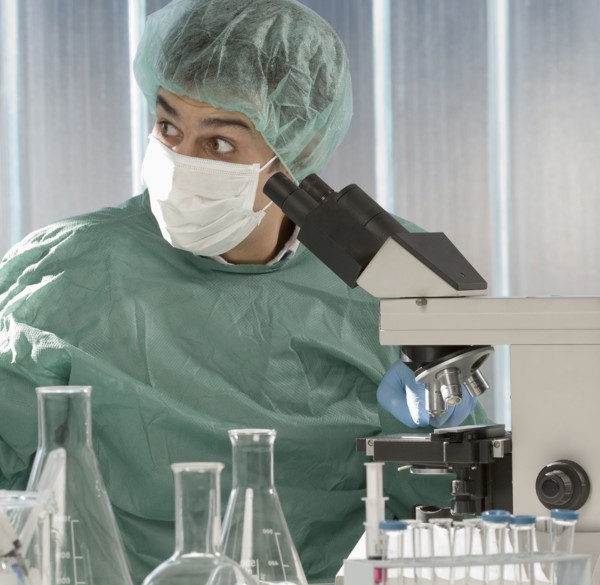 Caucasian scientist surprised in laboratory