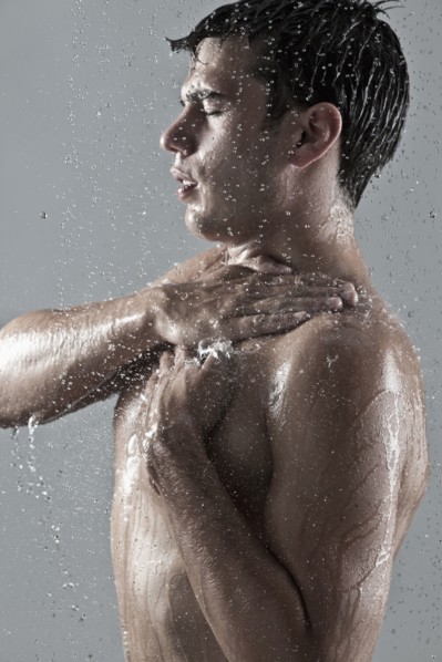 Caucasian man showering