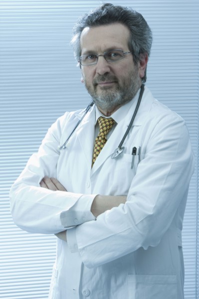 Portrait of Caucasian scientist with arms crossed