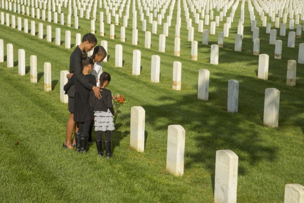 Black family at military cemetery
