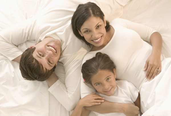Portrait of family laying down