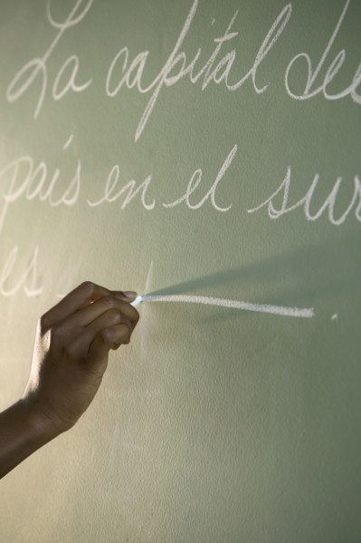 Hand writing on chalkboard