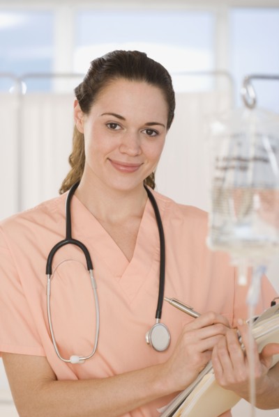 Hispanic female doctor holding chart