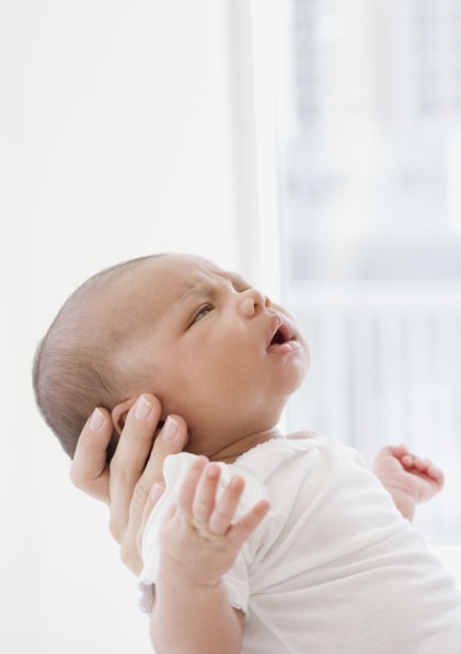 Mother holding newborn baby