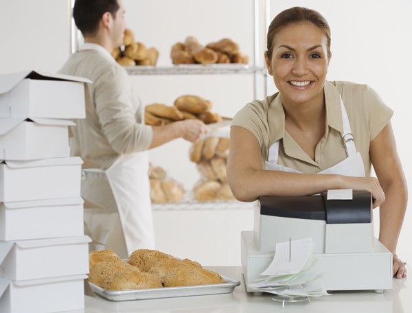 Portrait of Hispanic female bakery worker