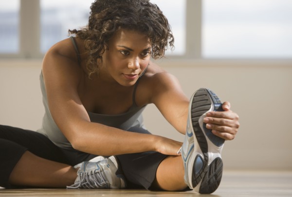 African woman stretching
