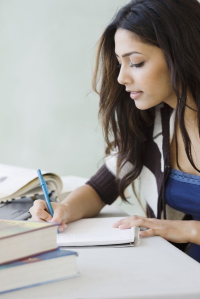 Middle Eastern woman studying