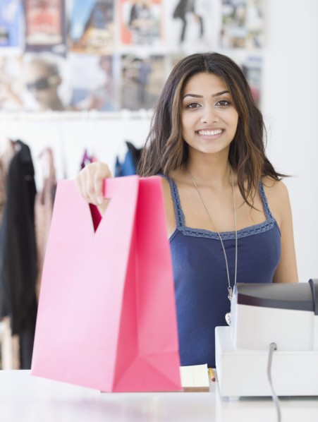 Middle Eastern sales clerk in shop
