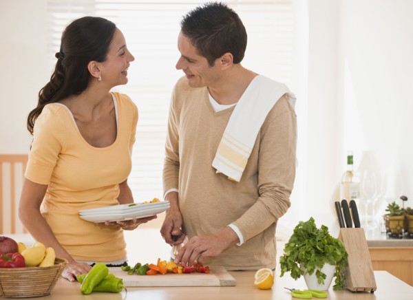 Hispanic couple cooking